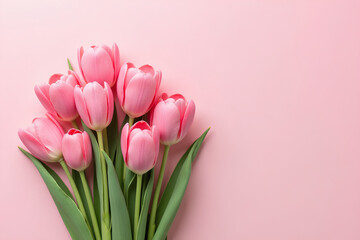 Beautiful composition spring flowers. Bouquet of pink tulips flowers on pastel pink background