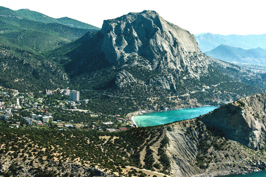 Aerial view of scenic coastline with majestic cliffs and tranquil sea, Novyi Svit, Crimea, Russia.