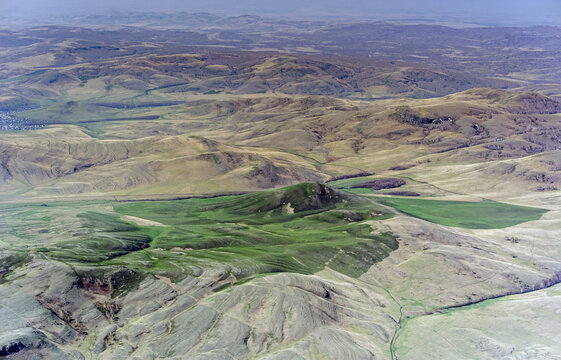 Aerial view of majestic mountains and serene valleys with untouched greenery, Bashkortostan Republic, Russia.