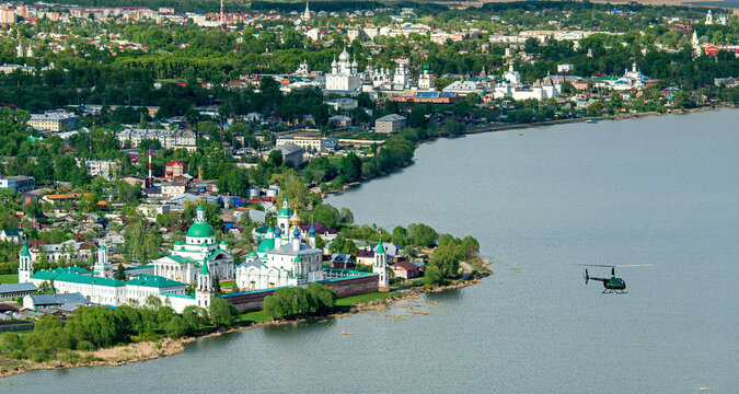 Aerial view of the beautiful Monastery of Saint Jacob Saviour surrounded by serene lake and lush greenery, Rostov, Russia.