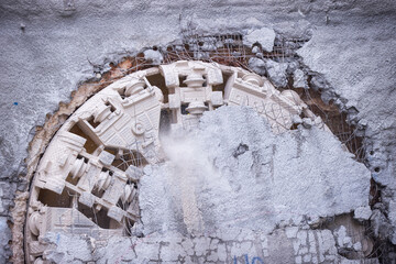 Tunnel boring machine(TBM) head on display at subway construction site ,underground infrastructure transportation