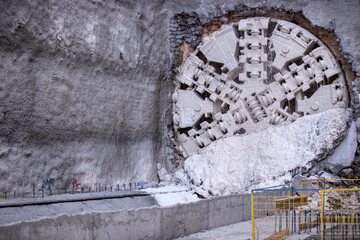 Tunnel boring machine(TBM) head on display at subway construction site ,underground infrastructure transportation