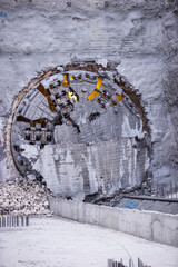 Tunnel boring machine(TBM) head on display at subway construction site ,underground infrastructure transportation