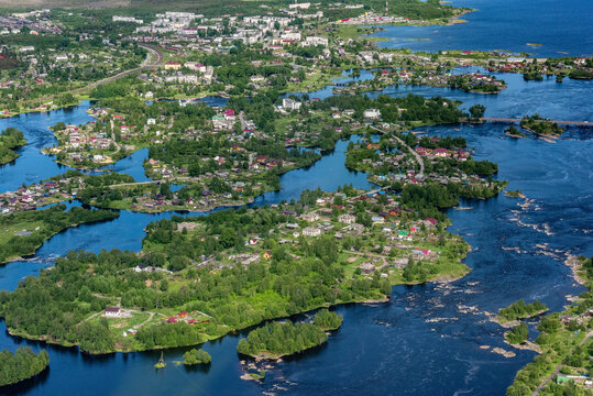Aerial view of serene Lake Onega with lush islands and tranquil forests, Karelia Republic, Russia.