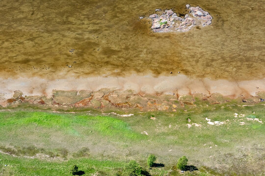 Aerial view of serene Onega Bay with rocky coast and beautiful greenery, Karelia Republic, Russia.