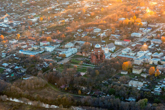 Aerial view of a vibrant urban landscape with beautiful buildings and colorful autumn trees, Urzhum, Russia.
