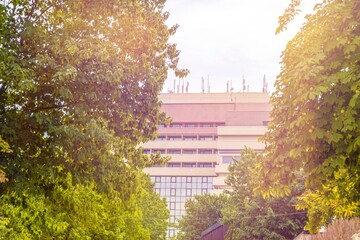 A real eco-friendly modern complex of a residential building or business center with a green...