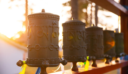 Closeup Buddhist Prayer Wheel with sunlight