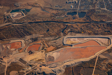 Illegal gold mining activities on river in forest, aerial top view. Concept deforestation, water...