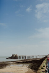 Historic pier at Mumbles beach, Swansea Bay in Wales