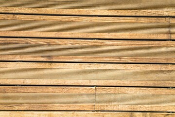 Granular material, solid wood with a structural surface for design textures. Grunge panel with rough coating