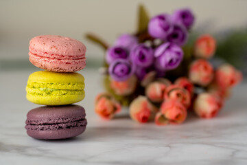 Colorful detail shot of macaroon cookies in mixed colors