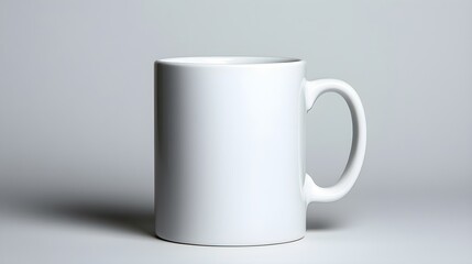 Fototapeta premium Plain white coffee mug on a minimalist background