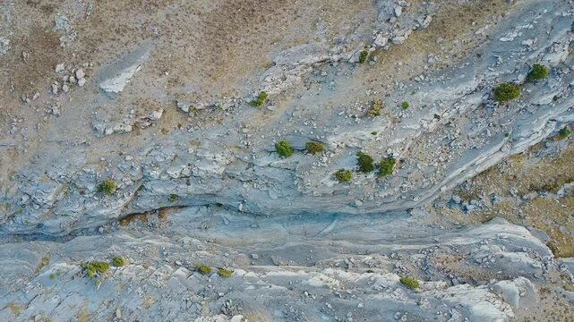 Drone fly over the Hojja Gur Gur Ota or Khodja Gur Gur Ota mountain range, Father of all caves, Boysuntau ridge, Surkhandarya region, Uzbekistan