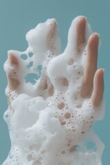 Person's hand with foam