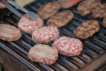Meat is being grilled on a barbecue