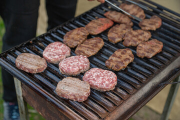 Meat is being grilled on a barbecue