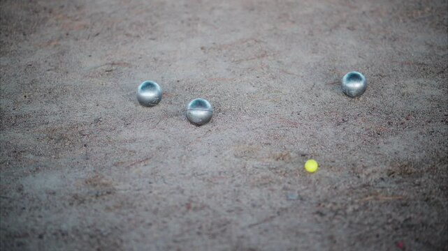 Close up of a marbles game on the beach