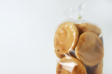 Closeup photo of opaque or rice crackers wrapped in plastic