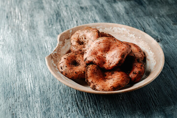 saffron milk cap mushrooms in a plate