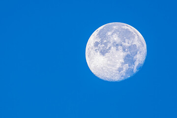 Fullmoon on blue sky at morning