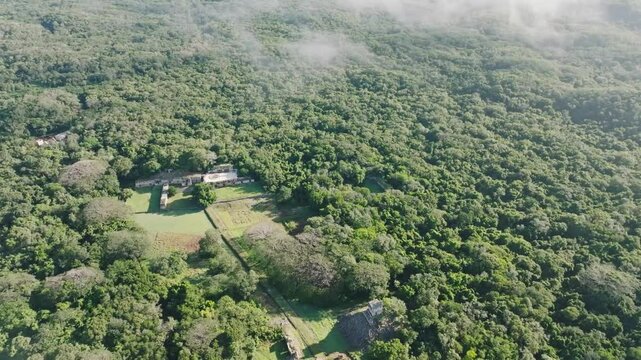 Aerial view of lush maya ruins surrounded by dense forest, Labna, Yucatan, Mexico.