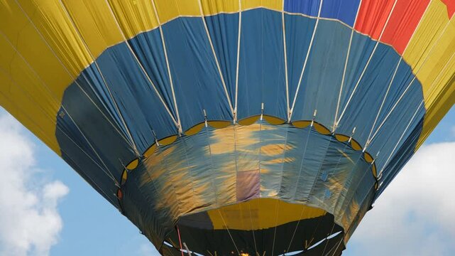 Detail of fire inflating the hot air balloon to fly