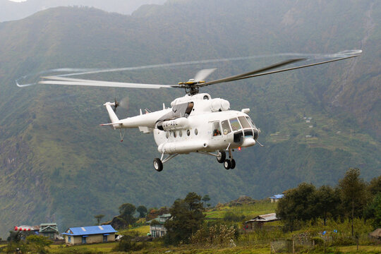 Soviet-made helicopter lands at Lukla Airport in the Himalayas