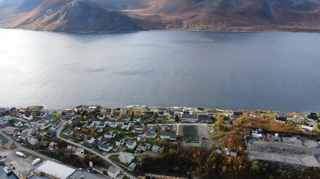 Aerial view of serene lofoten islands with picturesque village and majestic mountains, Husoy, Norway.