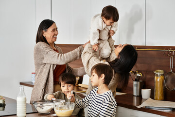 A happy family enjoys quality time in their kitchen baking delicious treats before Christmas.