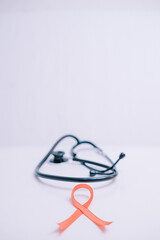 Stethoscope with a red ribbon, symbolizing World AIDS Day