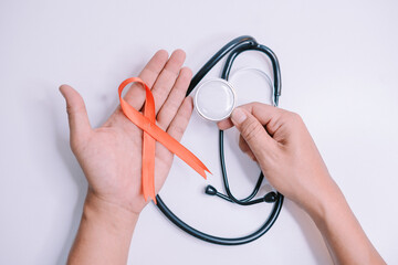Stethoscope with a red ribbon, symbolizing World AIDS Day