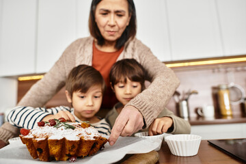 An Asian family enjoys baking delicious pastries together in their modern kitchen, celebrating the holidays.