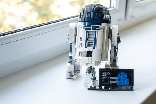 Lego building blocks set (R2D2) assembled by a Star Wars universum fan displayed at home on a window sill