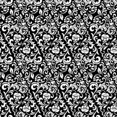 Floral pattern. Vintage wallpaper in the Baroque style. Seamless vector background. White and black ornament for fabric, wallpaper, packaging. Ornate Damask flower ornament.