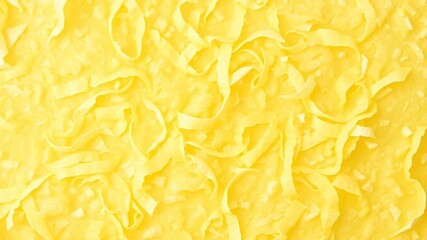 Obraz premium Vibrant green peel background with scattered citrus peels, texture, refreshing, peel-off