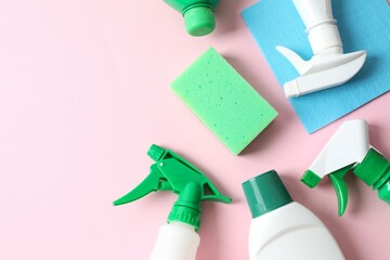 Many different house cleaning products on color background, top view