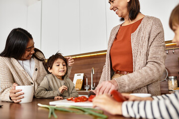 A cheerful family prepares holiday treats in their stylish kitchen, enjoying quality time together before Christmas.