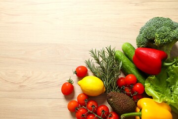 Clean healthy eating habits concept. Fruits, herbs, greens and vegetables mix, colorful juicy organic detox smoothie juice ingredients. Vegan vegetarian diet food