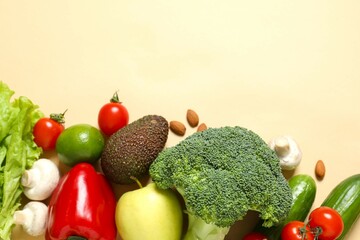 Clean healthy eating habits concept. Fruits, herbs, greens and vegetables mix, colorful juicy organic detox smoothie juice ingredients. Vegan vegetarian diet food