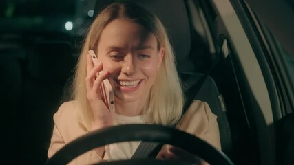 Drunk tipsy smiling laughing Caucasian woman female girl auto driver talk mobile phone call smartphone chatting unsafe driving danger stopped by police emergency light inside automobile car late night