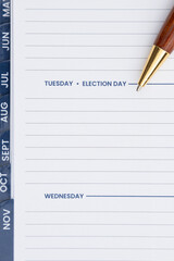Empty day planner with Tuesday Election Day with a pen