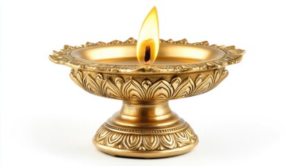 Gold brass diya lamp with a burning flame, representing spirituality and light, isolated on white