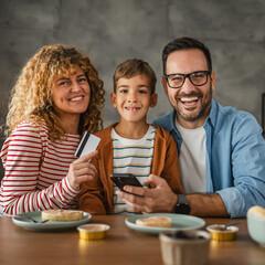 family of 3 have online shopping on mobile phone with credit card