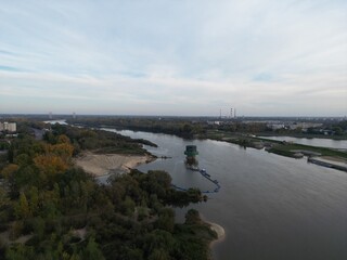 Confluence of Nature and Urbanization Aerial View of River Fork with Cityscape