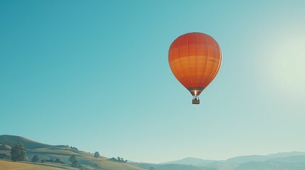Obraz premium Serene Hot Air Balloon Drifting Through Clear Sky