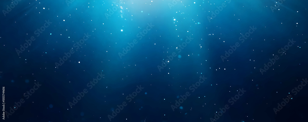 Poster a serene underwater scene with light rays and floating particles creating a tranquil atmosphere.