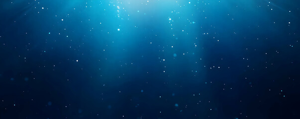 Fototapeta premium A serene underwater scene with light rays and floating particles creating a tranquil atmosphere.