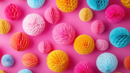 Vibrant festive backdrop featuring colorful paper balls perfect for greeting cards birthday celebrations invitations and carnival themes Flat lay perspective
