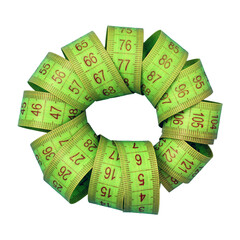Close-up of a flexible green measuring tape forming a circle, suggesting concepts of tailoring,...